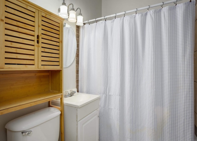  - bathroom with vanity and a shower with curtain