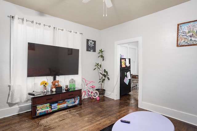  - living room with wood finished floors and a ceiling fan