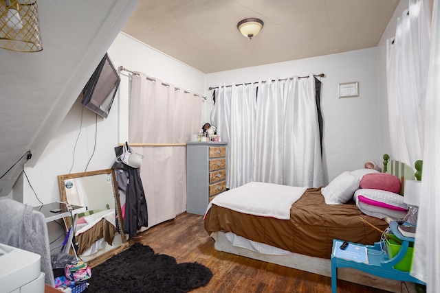  - bedroom with wood finished floors