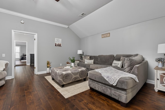 living room with lofted ceiling, crown molding, and dark hardwood / wood-style floors