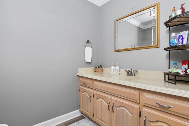 bathroom with vanity and crown molding