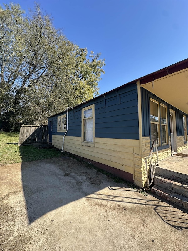 view of home's exterior with a patio area