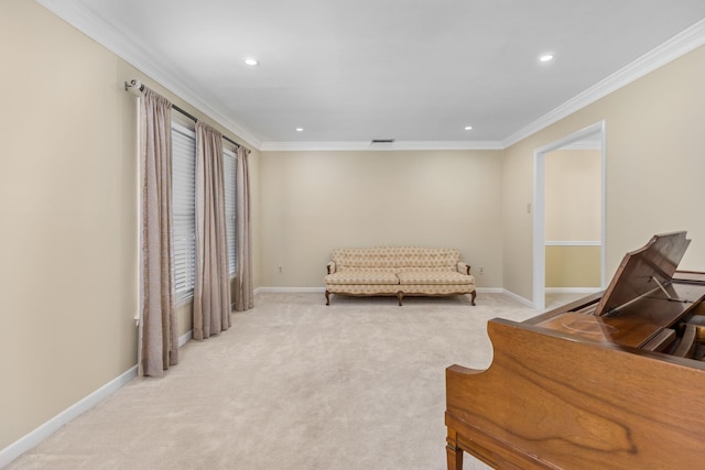 sitting room featuring light colored carpet and ornamental molding