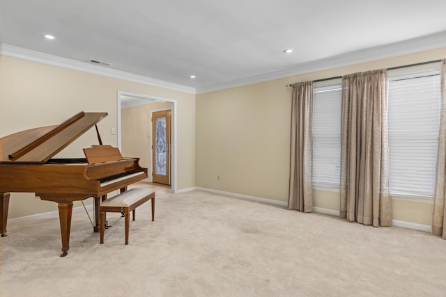 miscellaneous room with crown molding and light carpet