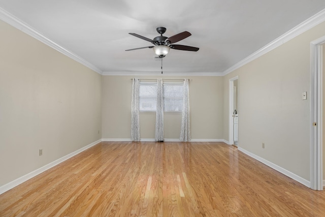 spare room with ceiling fan, ornamental molding, and light hardwood / wood-style flooring