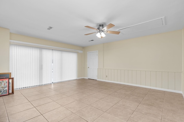 spare room featuring ceiling fan