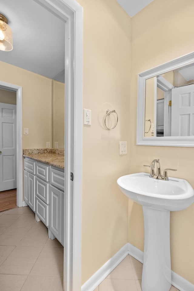 bathroom with sink and tile patterned floors