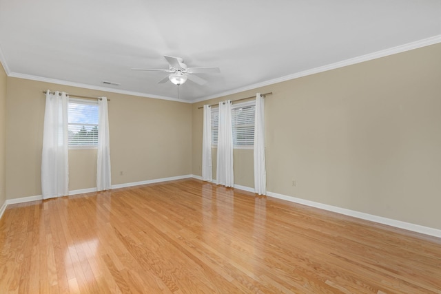 unfurnished room with crown molding, light hardwood / wood-style flooring, and ceiling fan