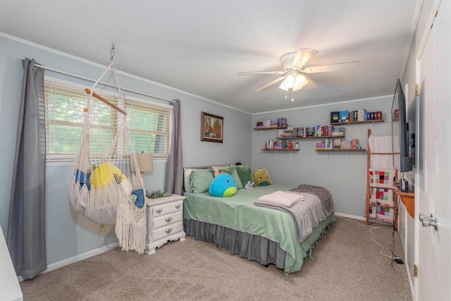  - bedroom with ornamental molding, carpet flooring, a textured ceiling, and ceiling fan
