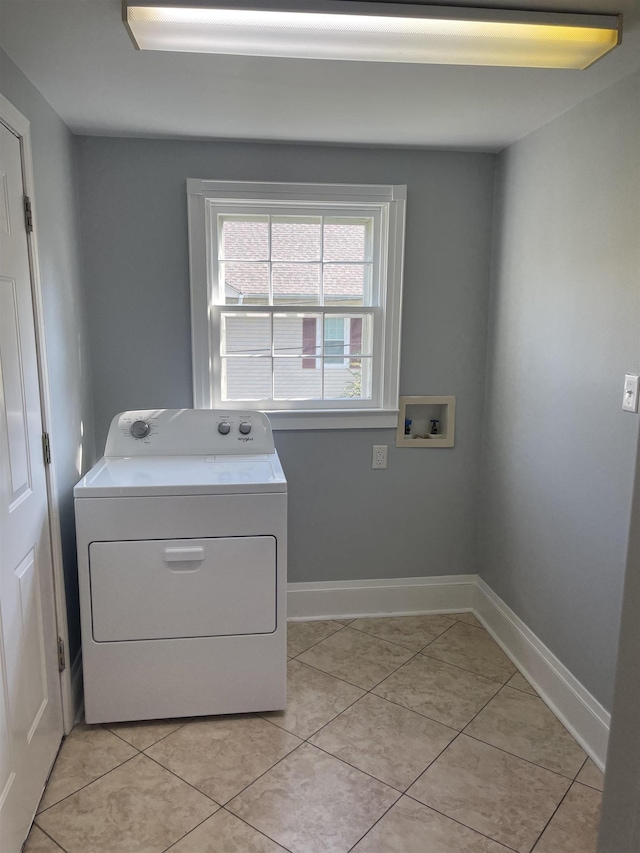 washroom with light tile patterned floors and washer / clothes dryer