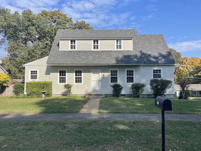 view of front facade featuring a front yard