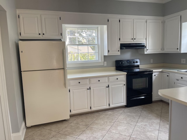 kitchen featuring white cabinets, white fridge, black range with electric stovetop, and light tile patterned flooring