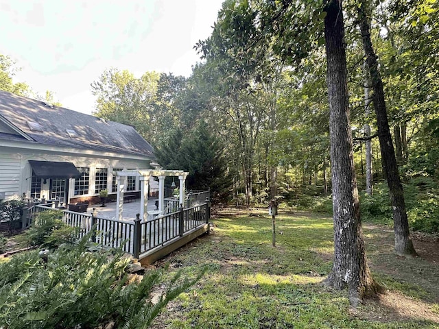 view of yard featuring a deck