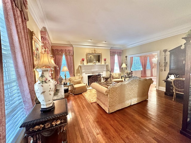 living room with ornamental molding and hardwood / wood-style flooring