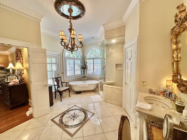 bathroom featuring vanity, an inviting chandelier, crown molding, tile patterned flooring, and shower with separate bathtub