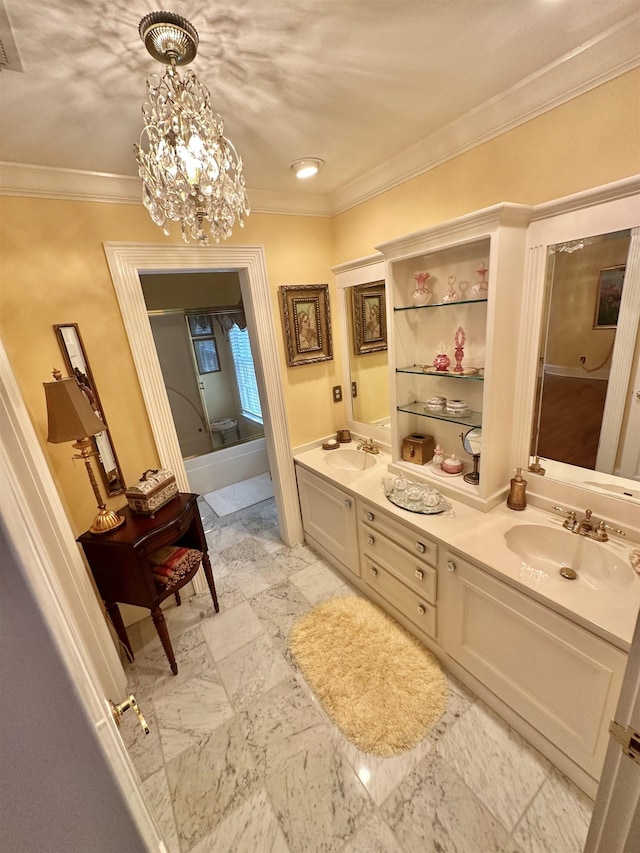 bathroom featuring a tub to relax in, vanity, a notable chandelier, and ornamental molding