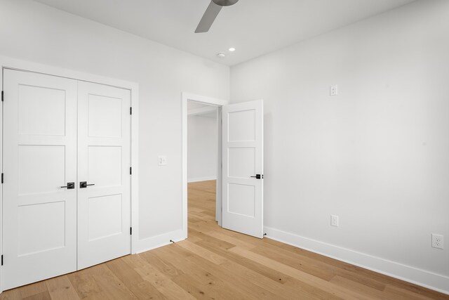 laundry area featuring hookup for an electric dryer, washer hookup, cabinets, and light tile patterned flooring