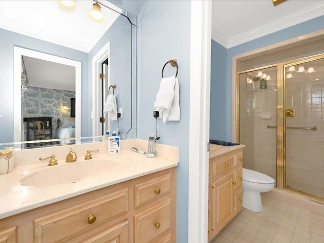 ensuite bathroom featuring connected bathroom, crown molding, toilet, vanity, and a shower stall