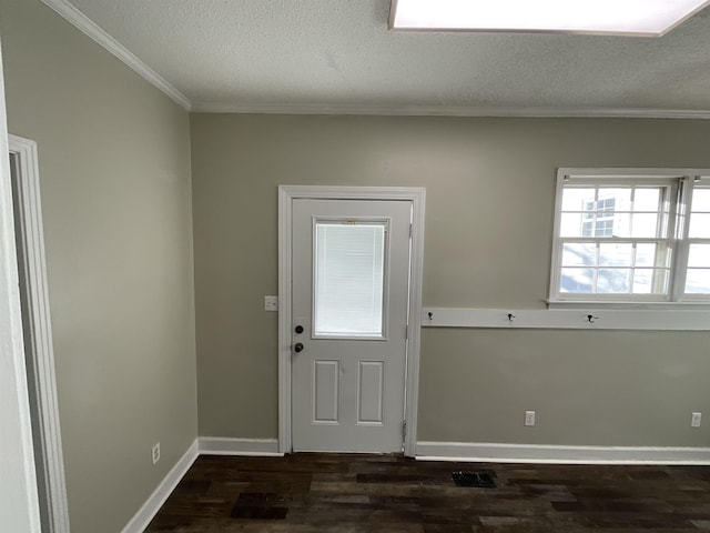 doorway featuring dark hardwood / wood-style flooring, crown molding, and a textured ceiling