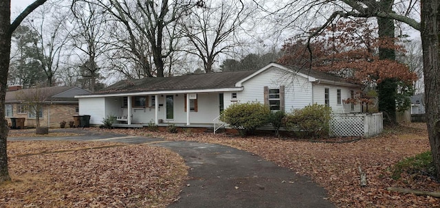 ranch-style house featuring a porch