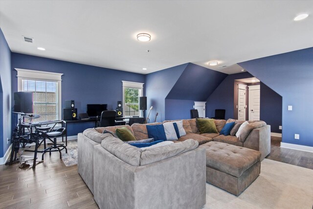 - living area featuring baseboards, recessed lighting, wood finished floors, and visible vents