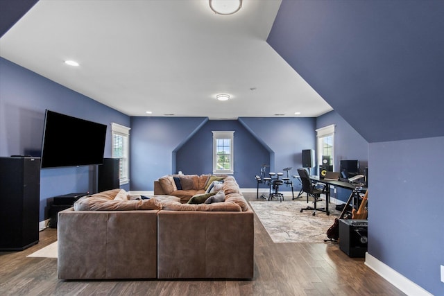  - living area with baseboards, dark wood-style floors, and plenty of natural light