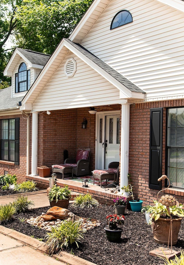  - view of front of home featuring brick siding
