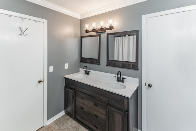 full bathroom featuring ornamental molding, a sink, baseboards, and double vanity