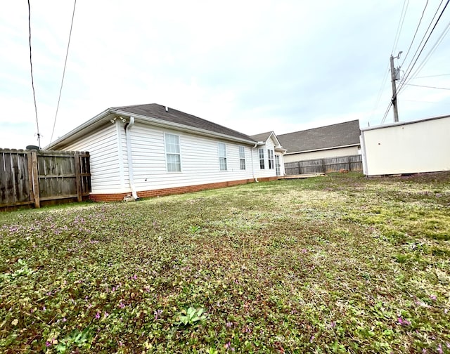 exterior space with a yard