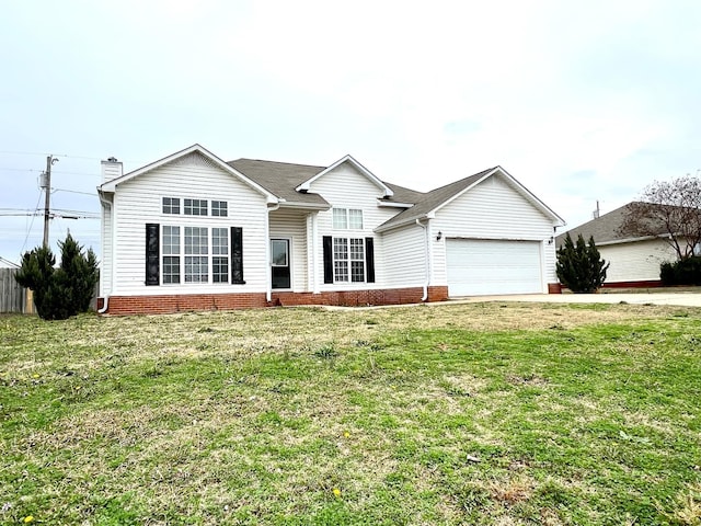 single story home with a garage and a front lawn