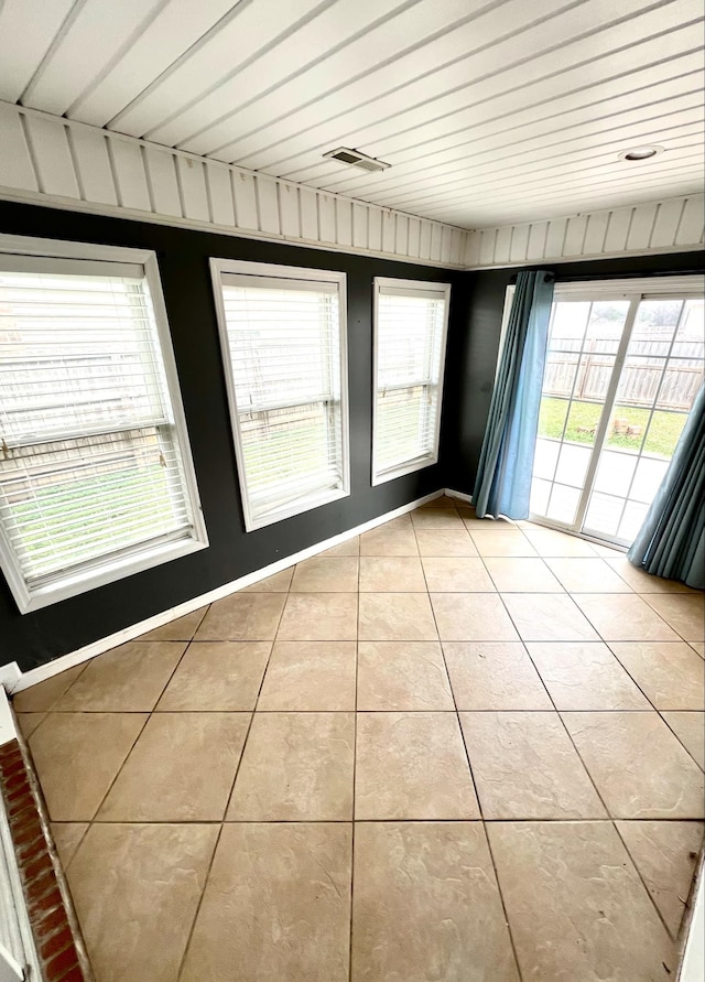 view of tiled spare room