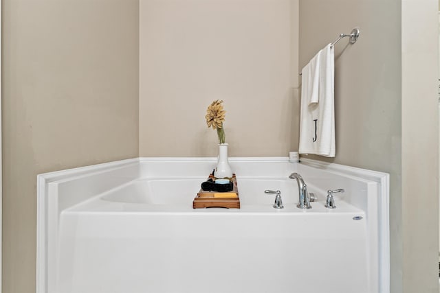 full bath with a garden tub