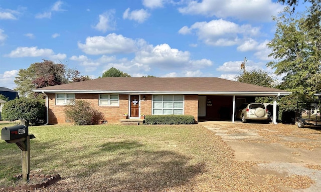 single story home with a front yard and a carport