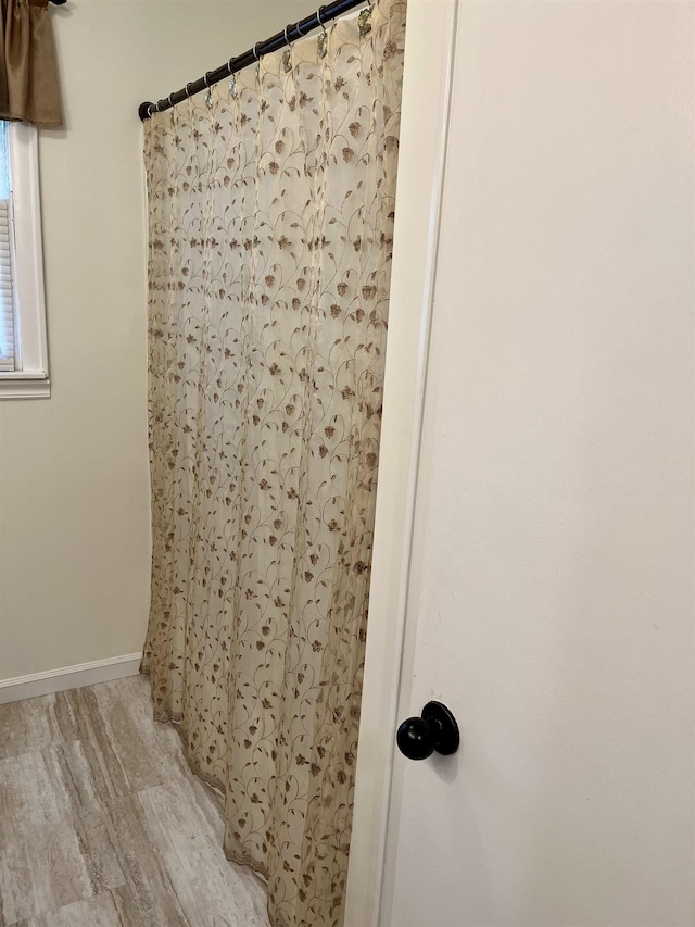 interior details featuring hardwood / wood-style floors