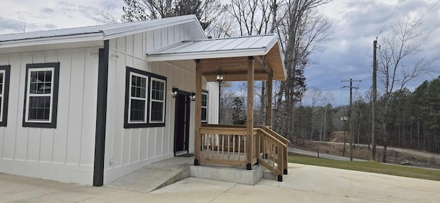 exterior space featuring metal roof