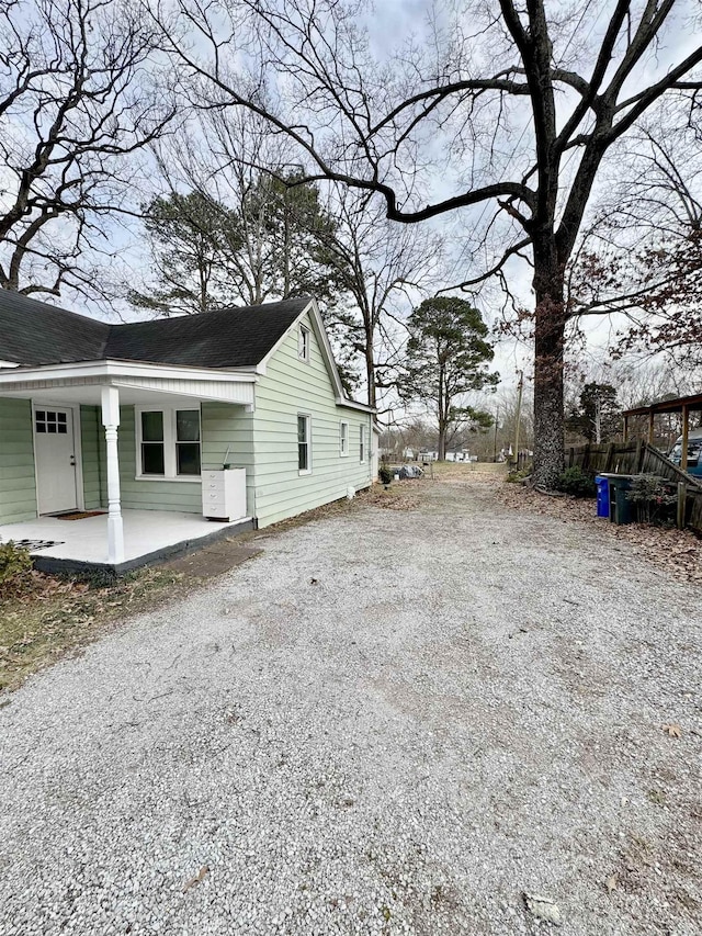 view of home's exterior featuring covered porch