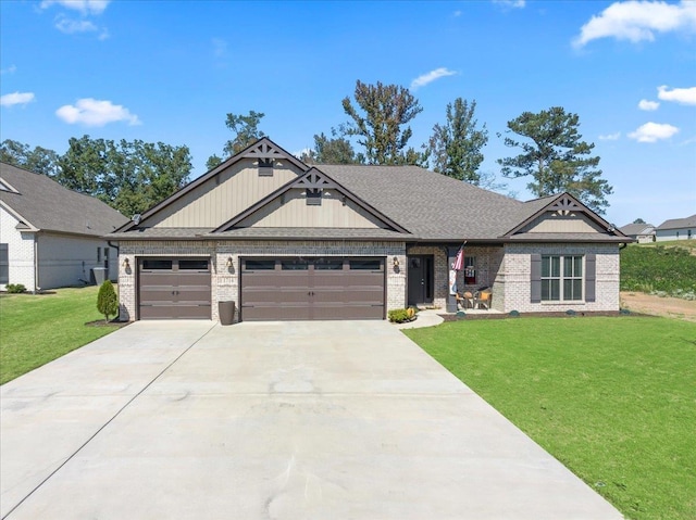 craftsman-style home featuring a front yard and a garage