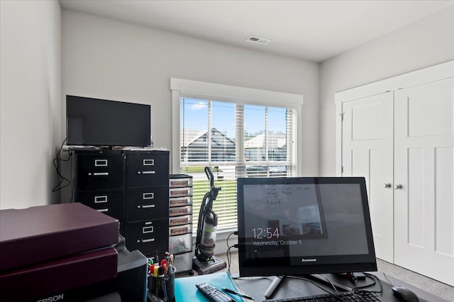 home office featuring carpet flooring