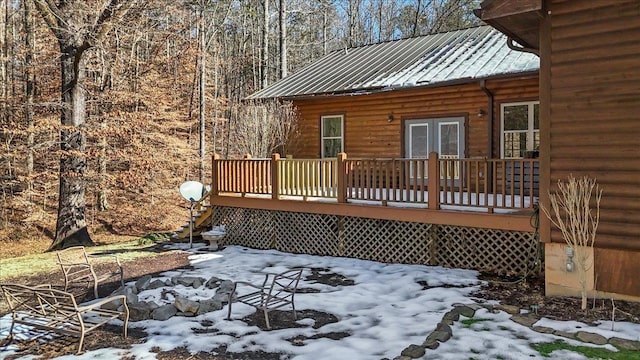 view of snow covered deck