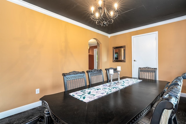  - dining room with arched walkways, crown molding, baseboards, and a chandelier
