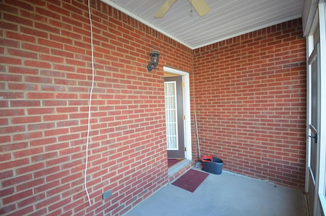 view of patio featuring ceiling fan