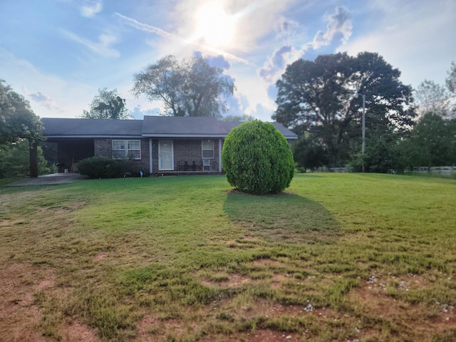 ranch-style house with a front lawn