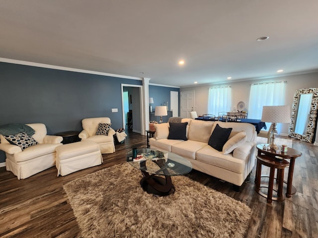 living room featuring ornamental molding, dark wood-type flooring, recessed lighting, and baseboards