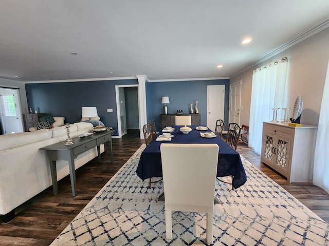 dining area featuring crown molding, ornate columns, dark wood finished floors, recessed lighting, and baseboards