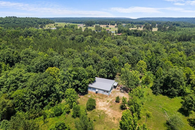 drone / aerial view with a view of trees