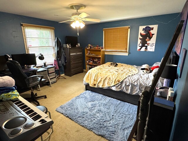  - bedroom featuring carpet floors, a desk, and ceiling fan