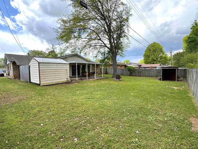  - view of yard featuring a patio