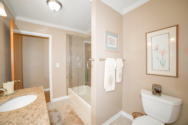 bathroom with baseboards, ornamental molding, toilet, and tile patterned floors