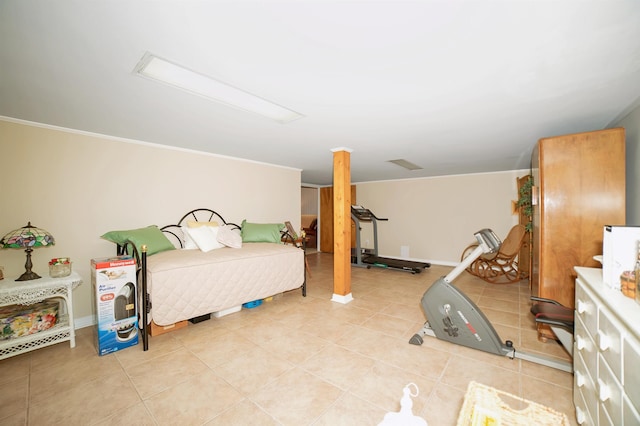 bedroom featuring baseboards and light tile patterned floors