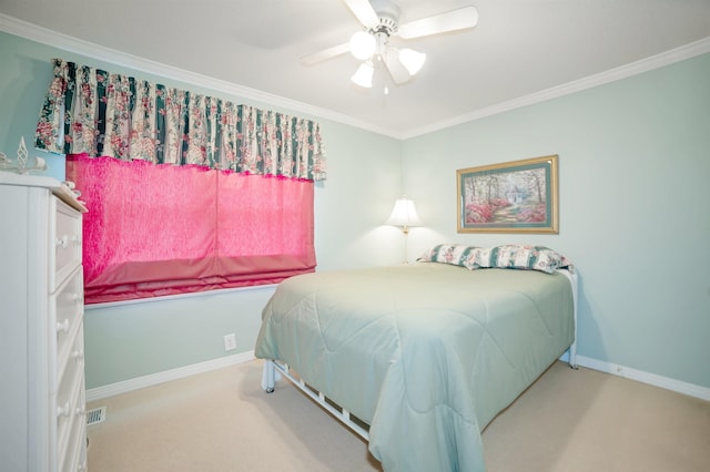 bedroom with crown molding, carpet, ceiling fan, and baseboards